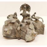 An 18-19th century Mughal Indian brass spice box with birds finials, H.9cm W.10cm