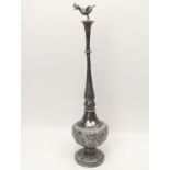 A late 19th/early 20th century large Indian silver rosewater sprinkler, bird finial, the body with