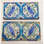 A pair of early 19th century North Indian Multan tiles with birds designs, 30cm x 15cm