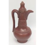 A 19th century Ottoman Egyptian asyut tophane type clay coffee pot H.19cm W.8cm