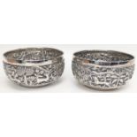 Two 19th century Indian silver bowls, Lucknow, embossed decor of flora and fauna, marks to both