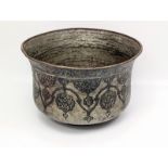 A 17th-18th century North Indian black lac inlaid tinned copper bowl, H.16cm D.20cm