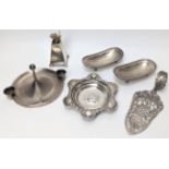 A collection of silver tableware, to include a pair of dishes, cake slicer, dish, candle burner