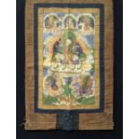 A fine 18-19th century Tibetan Thangka textile, 66cm x 39cm (painting size), 103cm x 63cm (cloth