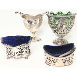 A collection of four Edwardian silver pierced containers, 3 with glass liners, various British