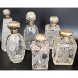 Six Victorian and Edwardian silver and glass scent bottles, all British hallmarks. Condition report:
