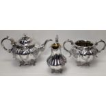 A Victorian silver tea set comprising of a teapot, sugar sifter and milk jug, hallmarked London,