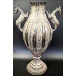 A Persian white metal vase, twin handles in the form of Ibex, H.31cm