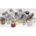 A collection of glass, ceramic and pottery mustard pots with silver plated lids