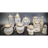 A collection of Victorian and later silver and glass containers. Condition report: Overall good,