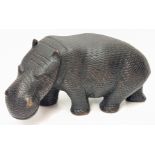 An African tribal carved ebony hippo