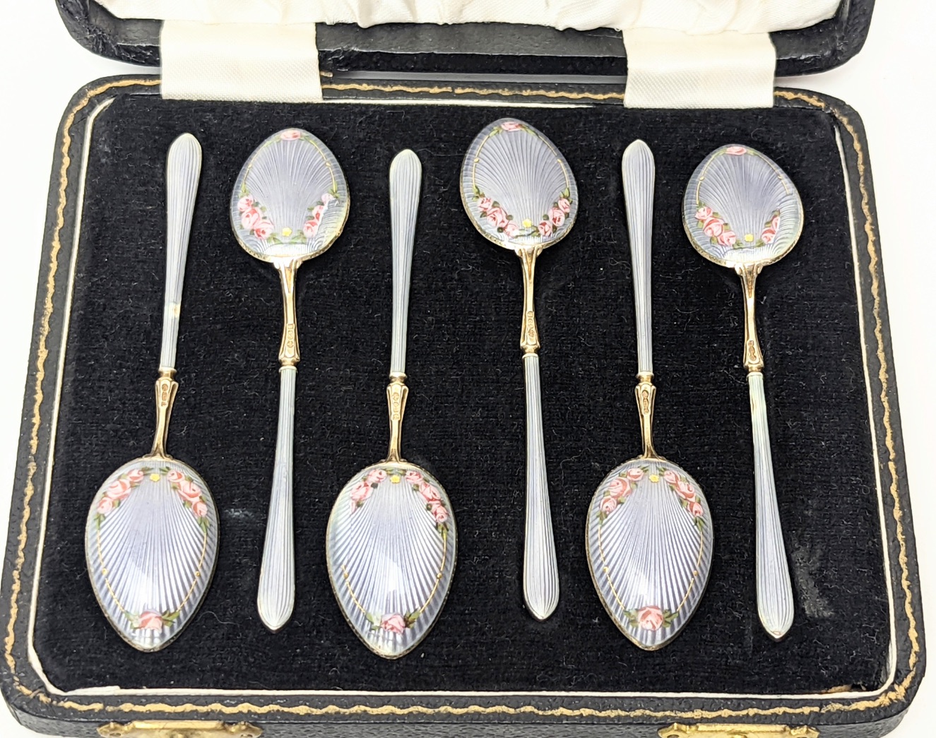 A set of 6 early 20th century enameled tea spoons, London import hallmarks