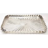 A late Victorian silver tray, swirl design with central vacant cartouche, hallmarked Birmingham
