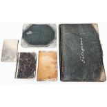 A collection of five leather and silver folders/purses, British hallmarks