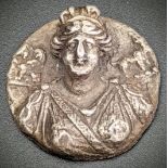 A possibly Roman silver medallion depicting a bust of a lady, H.3cm