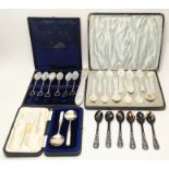 A collection of spoons to include a set of 12 mother of pearl spoons, a set of 6 mother of pearl and