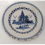 A 19th century Delft blue and white plate, D.22cm
