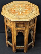 A 19th century Anglo Indian ivory inlaid occasional table, octagonal top, H.49cm Buyer note: This