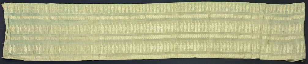 A 19th century Indian green ground textile, woven with Colonial soldier motifs in gold thread,