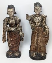 Pair of Burmese polychrome painted carved wood figures of a noble couple, Burma or Myanmar, H.34cm