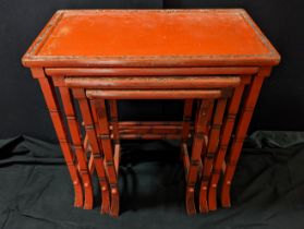 A nest of Chinese red lacquer tables