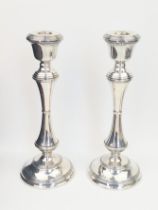 A pair of 20th century silver candlesticks, hallmarked Brimingham, 1967, maker W.I.Broadway & Co.,