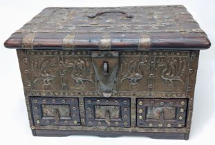 A Zanzibar chest, three lower drawers, brass bound and studded, H.21cm W.30cm