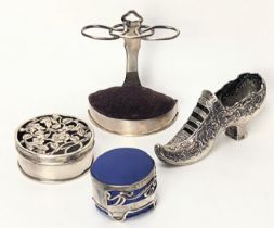 A silver shoe, London hallmarks and a Continental export hallmark, together with a William Comyns