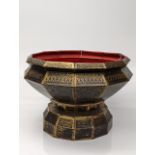 An early 20th century Thai lacquered and gilded metal 12-sided betel nut stand, D.24cm
