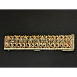 A 19th century Burmese or Thai pierced gilded wooden element inset with coloured mirrored glass,