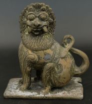 A 18-19th century Indian brass lion or Yali figure, H.10cm W.9cm