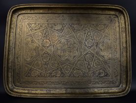 A fine large 19th century Persian Qajar engraved brass tray, 57cm x 43cm