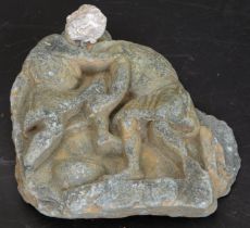 A fine 12th century or earlier Indian carved grey schist stone fragment depicting two men wrestling,
