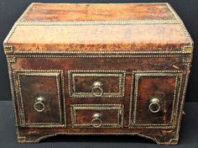 A Moroccan leather chest, H.64cm W.80cm