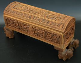 A finely carved 19th century Indian Mysore sandalwood box resting on four elephant shaped legs, H.