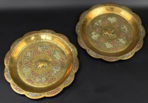 Two early 20th century Sri Lankan silver inlaid brass dishes, D.17.5cm