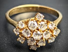 A Diamond spray cluster cocktail ring, approx 1ct. combined, mounted on 18ct yellow gold mount, 3.