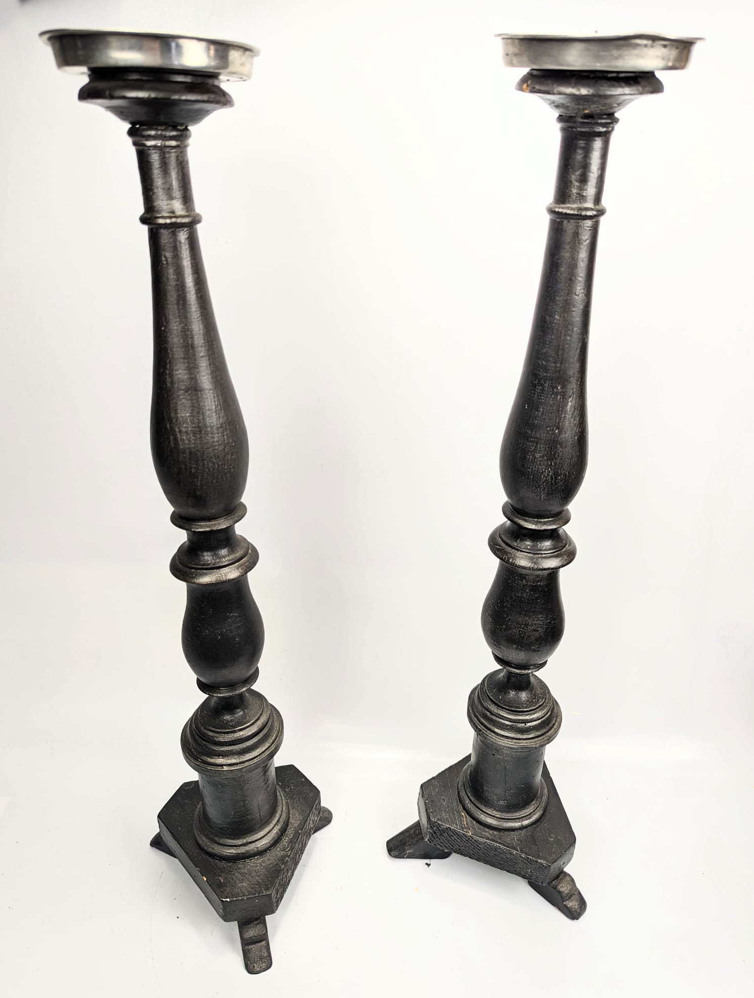 A pair of contemporary wooden candlesticks, H.65cm