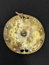 A 19th century Nigerian brass roundel from a chief sword, Berom People