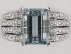 An aquamarine ring, 4.43cts emerald cut, mounted on platinum with VS diamonds approx 0.6cts