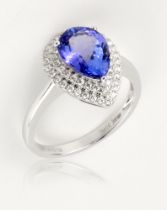 A tanzanite ring, 2.39cts pear cut, mounted on 18ct white gold with VS diamonds approx.0.33cts