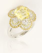 A yellow sapphire ring, 4.55 cts, unheated, floral style mount with diamonds and yellow diamonds