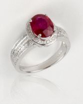 A ruby and diamond ring, oval cut 2.54cts Vietnamese unheated, mounted on 18ct white gold with small