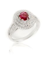 A ruby and diamond ring, 0.82cts oval cut Burmese ruby, surrounded by 3 bands of diamonds approx 0.