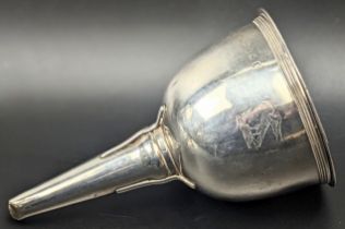A George III silver wine funnel, hallmarked London, 1807, L.12cm