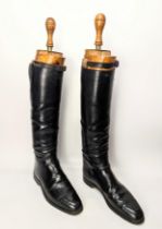 A pair of leather riding boots with stretchers by Bartley & Sons of Oxford St. London
