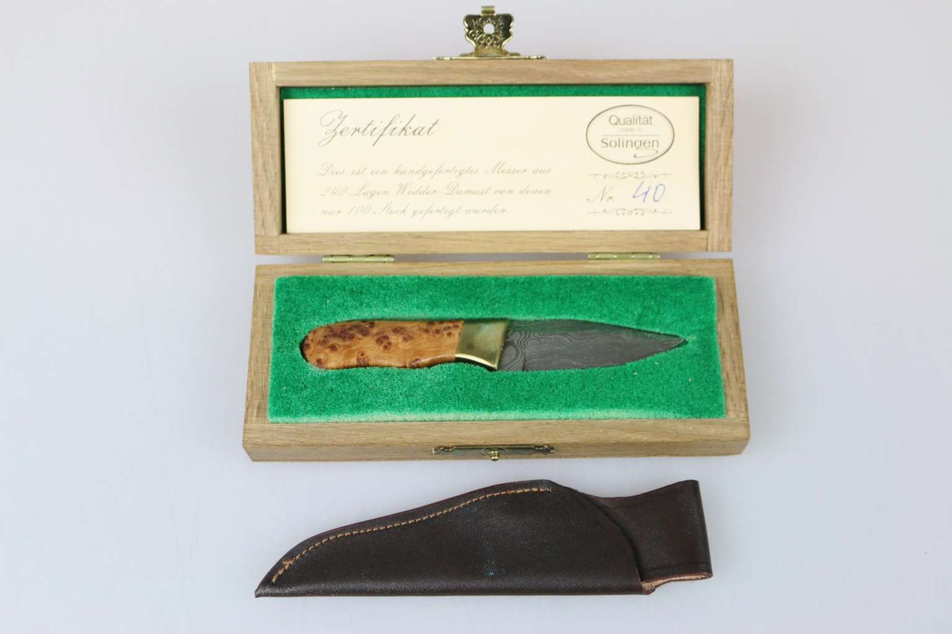 Solingen, handgefertigtes Messer aus 240 Lagen Widder-Damast