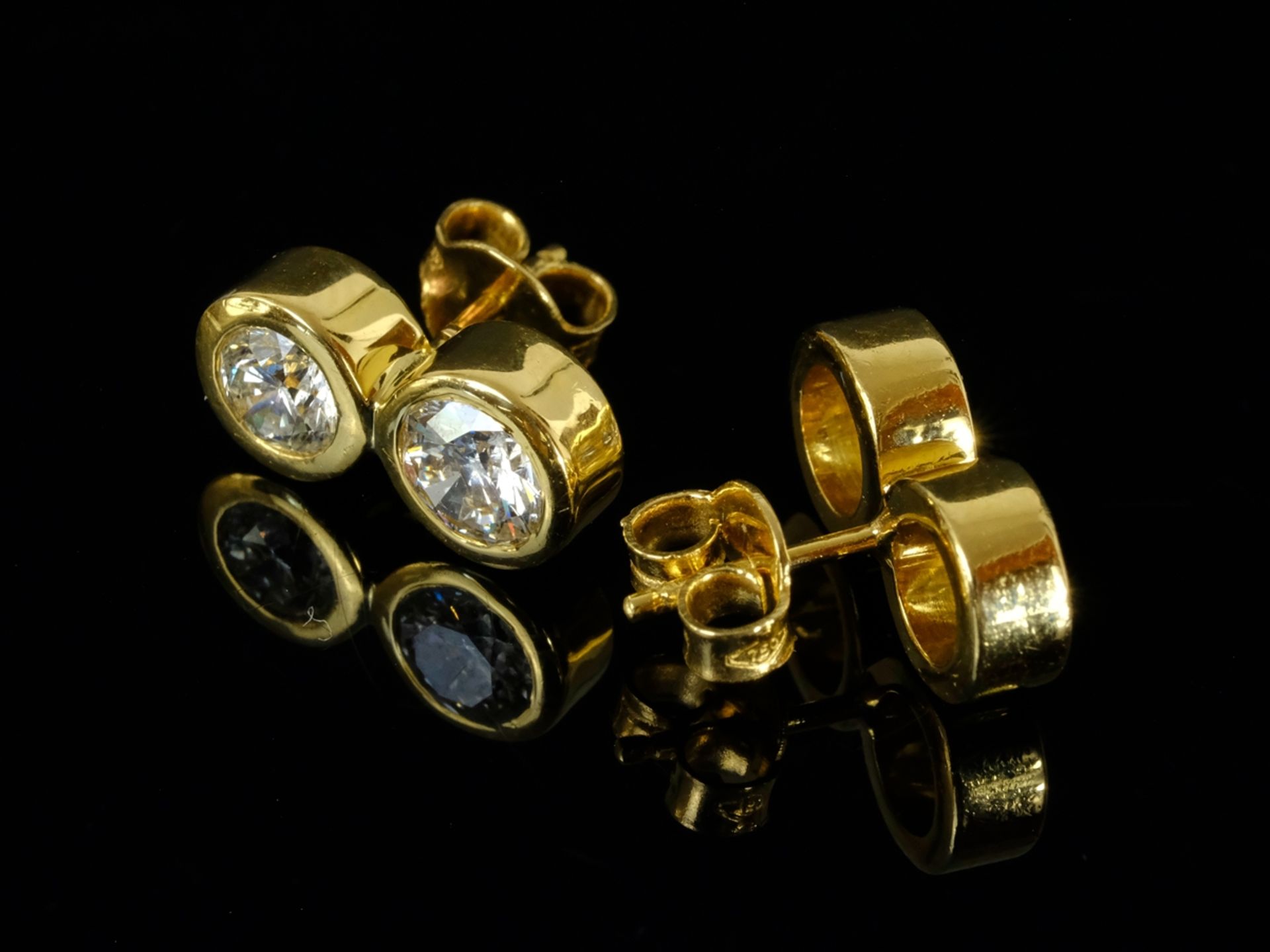 PAIR OF BRILLIANT DOUBLE EAR PLUGS, each with two linked set diamonds, total around 2ct, w/vs, 750
