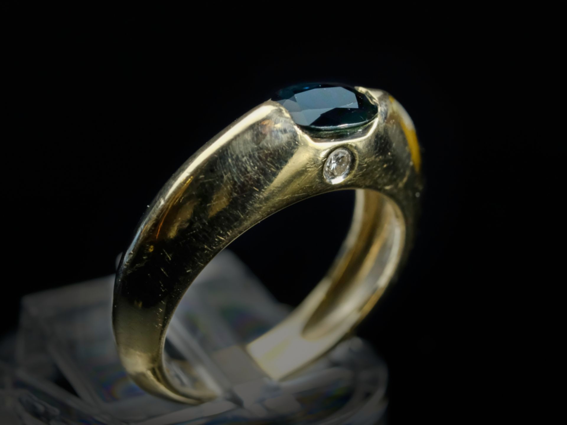 PIAGET RING set with dark blue oval sapphire (0.81ct), a brilliant-cut diamond around 0.03ct on the