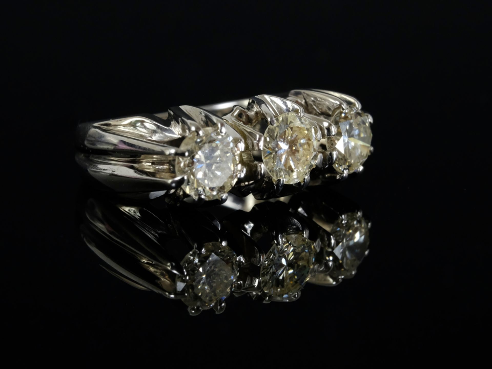 BRILLANT RING with three large brilliants, entire band around 2.25ct, approx. g-p1, 750 white gold, - Image 2 of 2